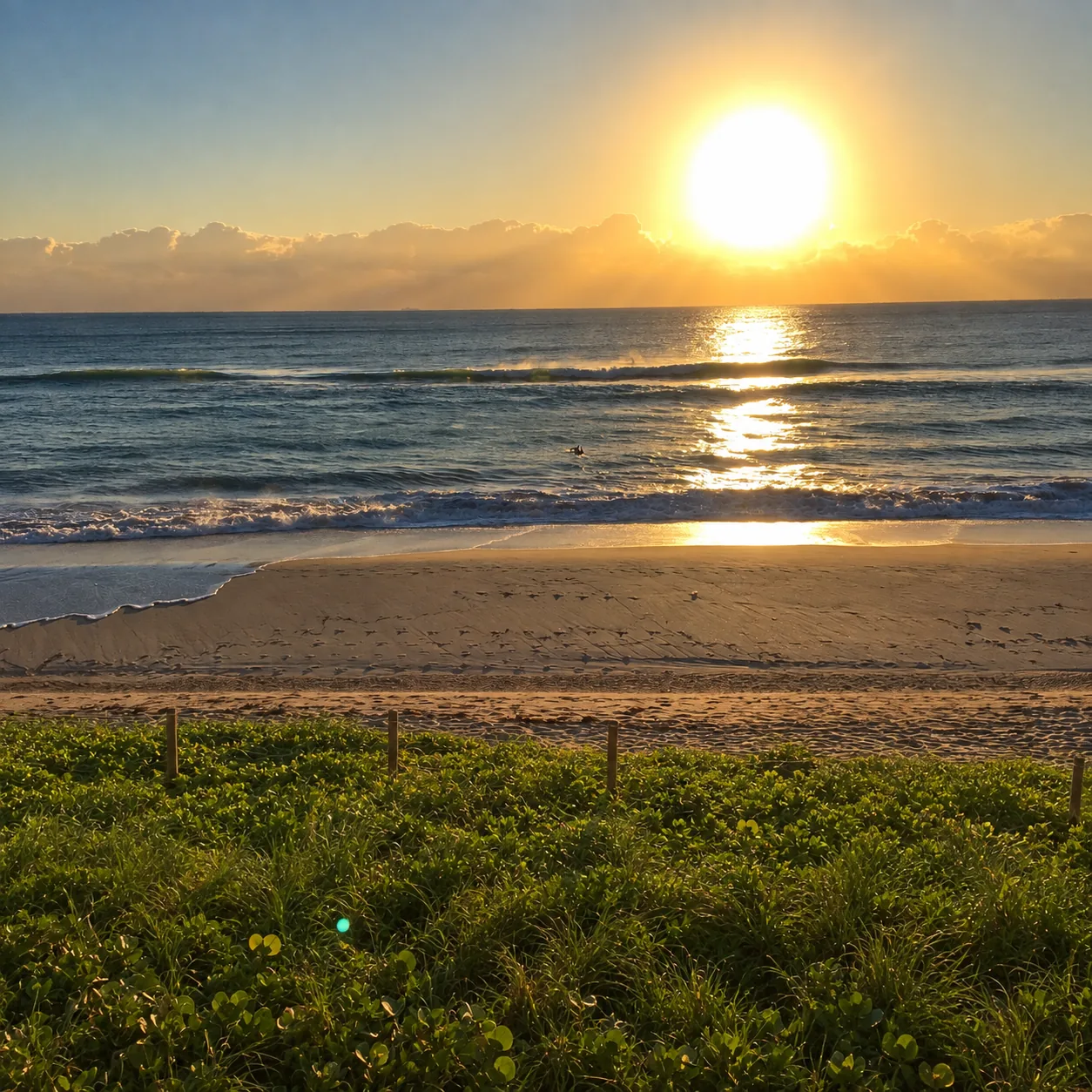 The sun over the ocean at HEED Beach, Hallandale Beach